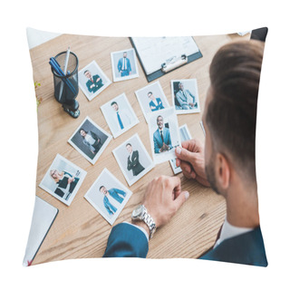 Personality  Selective Focus Of Recruiter Holding Photo Of African American Man On Wooden Table  Pillow Covers