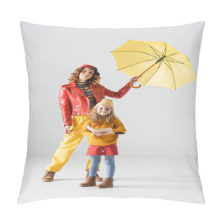 Personality  Mother And Daughter In Colorful Red And Yellow Outfits With Umbrella And Book On Grey Background Pillow Covers