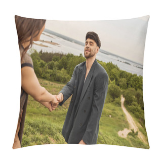 Personality  Smiling And Bearded Man In Stylish Newsboy Cap And Jacket Holding Hand Of Blurred Brunette Girlfriend While Standing With Blurred Nature And Sty At Background, Fashion-forwards In Countryside Pillow Covers