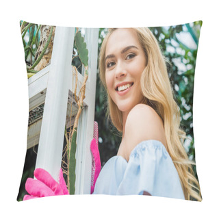 Personality  Low Angle View Of Beautiful Blonde Woman In Pink Rubber Gloves Smiling At Camera In Greenhouse Pillow Covers