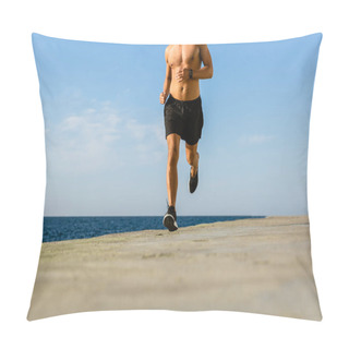 Personality  Cropped Shot Of Shirtless Sportsman Jogging On Seashore Pillow Covers