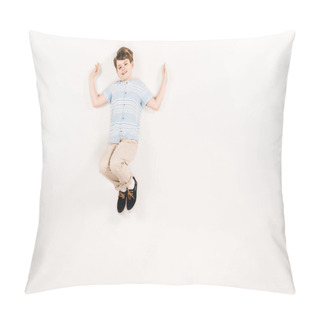 Personality  Top View Of Happy Kid Looking At Camera While Lying On White  Pillow Covers