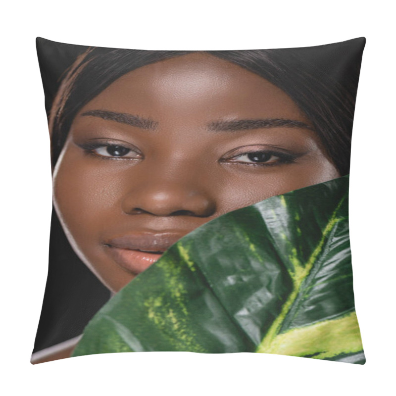 Personality  african american woman with green exotic leaf isolated on black pillow covers