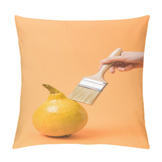 Personality  Cropped View Of Woman Holding Paintbrush Near Yellow Painted Pumpkin On Orange Background Pillow Covers