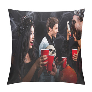 Personality  Happy Asian Woman In Black Wreath Clinking Plastic Cups With Man Near Blurred Friends On Black   Pillow Covers