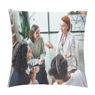 Personality  High Angle View Of Redhead Psychologist Pointing With Hands And Talking To Smiling Multicultural Women During Motivation Therapy In Consulting Room, Friendship And Mental Wellness Concept Pillow Covers