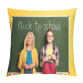 Personality  Smiling Schoolkids With Backpacks Standing Near Chalkboard With Back To School Lettering  Pillow Covers