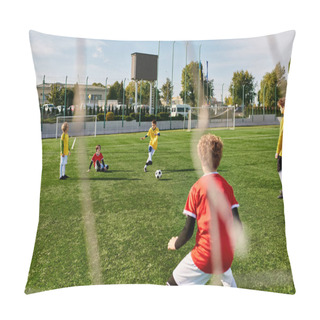 Personality  A Group Of Young Children Are Playing An Energetic Game Of Soccer On A Grassy Field. They Are Running, Passing, And Kicking The Ball With Excitement And Teamwork. The Children Are Laughing And Cheering As They Engage In Friendly Competition. Pillow Covers