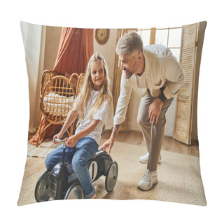 Personality  Cheerful Man Assisting Cute Daughter Riding Toy Car In Modern Living Room At Home, Playing Together Pillow Covers