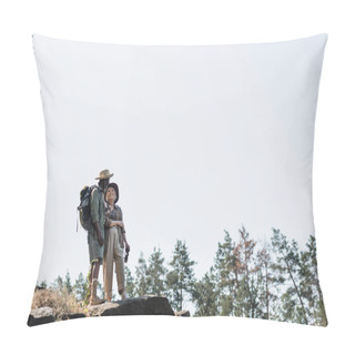 Personality  Senior Woman Smiling At African American Husband With Backpack On Rock In Forest  Pillow Covers