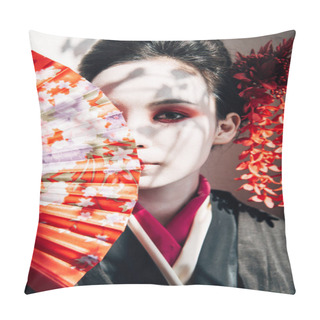 Personality  Beautiful Geisha With Red And White Makeup Holding Hand Fan Near Face In Sunlight Pillow Covers