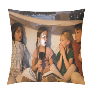 Personality  Girl Holding Flashlight Near Scared Interracial Friends Under Blanket And Christmas Decor At Home  Pillow Covers