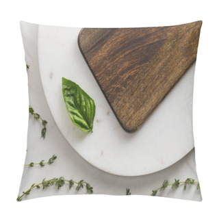 Personality  Top View Of Round Marble Surface With Brown Wooden Cutting Board And Basil Leaf Near Thyme Twigs On White Background Pillow Covers