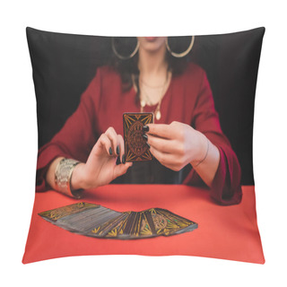 Personality  KYIV, UKRAINE - FEBRUARY 23, 2022: Cropped View Of Blurred Witch Holding Tarot Card Isolated On Black  Pillow Covers