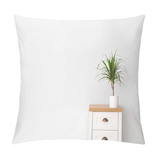 Personality  Dracaena On Chest Of Drawers Near White Wall, Space For Text. Home Plants Pillow Covers