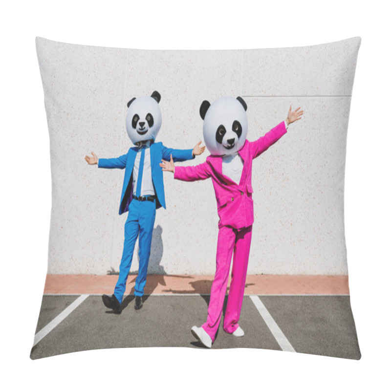 Personality  Storytelling image of a couple wearing giant panda head and colored suits. Man and woman making party in a parking lot. pillow covers