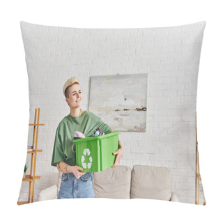Personality  Cheerful Tattooed Woman Holding Clothing In Plastic Box With Recycling Sign In Modern Living Room With Green Plants On Racks, Sustainable Living And Environmentally Friendly Habits Concept Pillow Covers