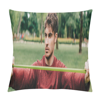 Personality  Panoramic Crop Of Sportsman Pulling Up Resistance Band In Park  Pillow Covers
