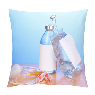 Personality  Bottle And Bag Of Intravenous Antibiotics And Plastic Infusion Set On Wooden Table On Blue Background Pillow Covers