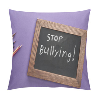 Personality  Top View Of Chalkboard In Wooden Frame With Stop Bullying Lettering Near Colored Pencils On Purple Background Pillow Covers