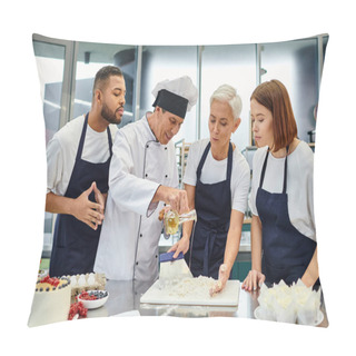 Personality  Joyful Multiracial Chefs In Blue Aprons Watching Chief Cook Pouring Oil On Dough, Confectionery Pillow Covers