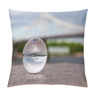 Personality  Glass Transparent Ball On Bridge Background And Grainy Surface. With Empty Space Pillow Covers