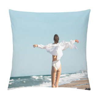 Personality  Back View Of Young Woman In White Shirt And Swimwear Standing With Outstretched Hands Near Ocean On Beach  Pillow Covers