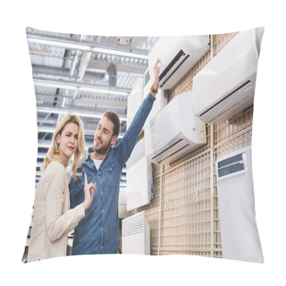 Personality  Boyfriend Pointing With Hand At Air Conditioner And Girlfriend Showing No Gesture In Home Appliance Store  Pillow Covers
