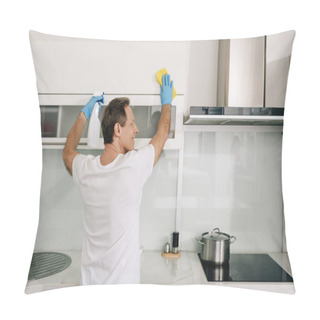 Personality  Happy Man In Rubber Gloves Holding Spray Bottle And Rag While Cleaning Kitchen  Pillow Covers