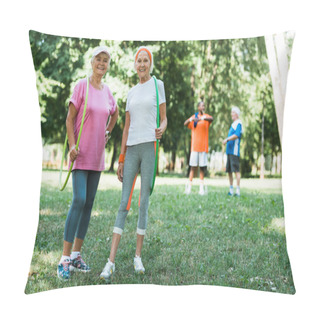 Personality  Selective Focus Of Cheerful Senior Women Smiling While Holding Hula Hoops Near Multicultural Retired Men  Pillow Covers