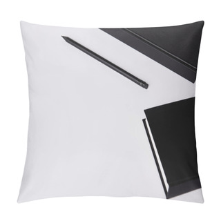 Personality  Close-up Shot Of Black Hard Cover Notebooks With Pencil On White Tabletop Pillow Covers
