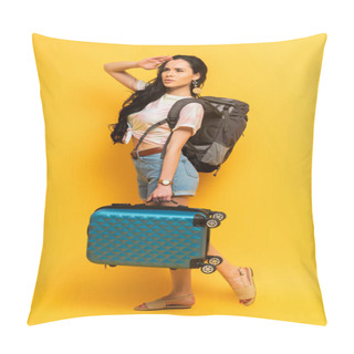 Personality  Brunette Woman With Backpack And Suitcase Looking Away On Yellow Background Pillow Covers