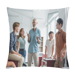 Personality  Mature Teacher Pointing With Finger Near Cheerful Multiethnic Kids  Pillow Covers