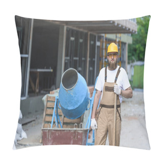 Personality  Young Builder In Hardhat And Protective Googles Standing With Shovel Near Concrete Mixer At Construction Site  Pillow Covers