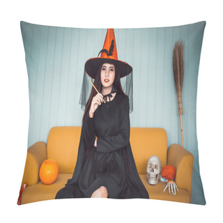 Personality  Attractive Beautiful Asian Woman Dressed As A Witch Holding Magic Wand On Hand And Sitting On Yellow Sofa, Halloween Holidays In Cinematic Tone.   Pillow Covers