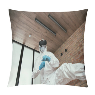 Personality  Low Angle View Of Man In Hazmat Suit, Medical Mask, Latex Gloves And Virtual Reality Headset Gaming In Living Room  Pillow Covers