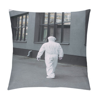Personality  Back View Of Epidemiologist In Hazmat Suit Walking Along Building Pillow Covers