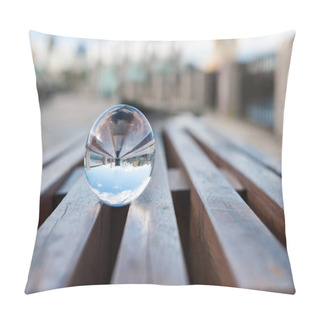 Personality  Glass Transparent Ball On Wooden Slats Background. With Empty Space Pillow Covers