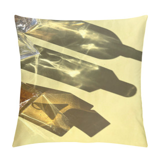 Personality  Vertical Top View Shot Of Beautiful Artistic Highlights And Shadows Of Glass Bottles With Sun Shining Through Pillow Covers