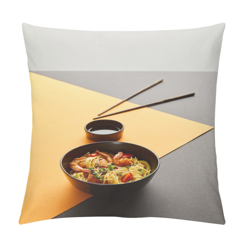 Personality  Selective Focus Of Noodles With Shrimps And Vegetables In Bowl Near Chopsticks, Soy Sauce On Black And Yellow Background Isolated On Grey Pillow Covers