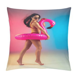Personality  Fashion Portrait Of Young Fit And Sportive Woman With Rubber Flamingo In Stylish Red Swimwear On Gradient Background. Perfect Body Ready For Summertime. Pillow Covers
