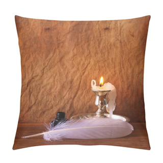 Personality  Low Key Image Of White Feather, Inkwell And Burning Candle On A Wooden Table Pillow Covers