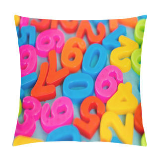 Personality  Selective Focus Of Colorful Plastic Numbers On Blue Surface Pillow Covers