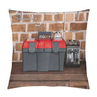 Personality  Close-up Shot Of Toolbox Standing On Kitchen Table With Toaster In Front Of Brick Wall Pillow Covers