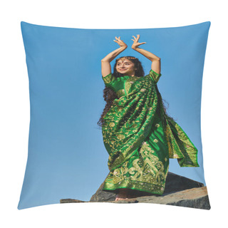 Personality  Cheerful Young Indian Woman In Green Sari Posing On Stone With Blue Sky On Background Pillow Covers