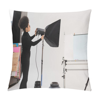 Personality  Side View Of African American Content Manager In Black Clothes Assembling Softbox Reflector In Modern Photo Studio Pillow Covers