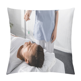 Personality  Cropped View Of Hypnotist Standing Near Man On Massage Table And Holding Green Stone Pillow Covers