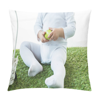 Personality  Partial View Of Baby Sitting On Green Grass And Holding Yellow Chicken Egg Isolated On White Pillow Covers