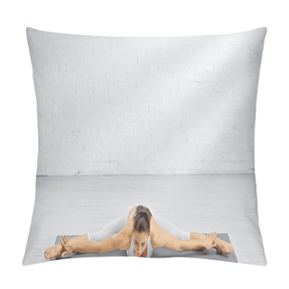 Personality  Flexible Sportswoman Bending Forward During Split On Yoga Mat  Pillow Covers