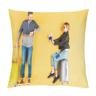 Personality  Woman Sitting On Valise With Tickets While Man Looking At Watch On Yellow Background Pillow Covers